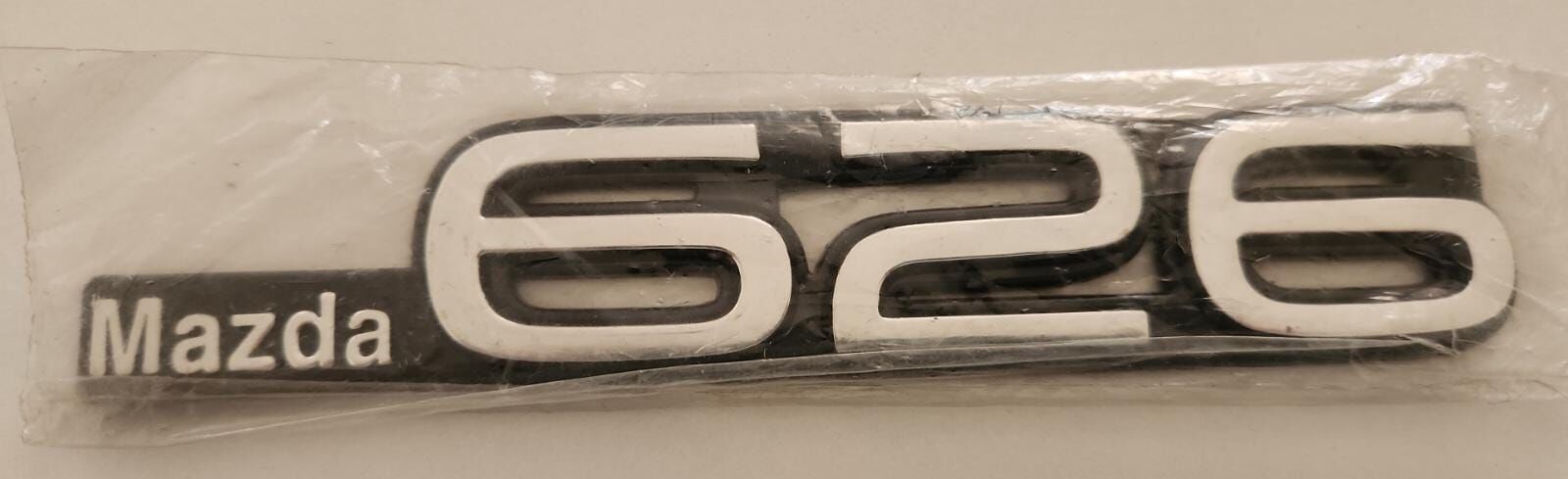 626 Mazda Yazı